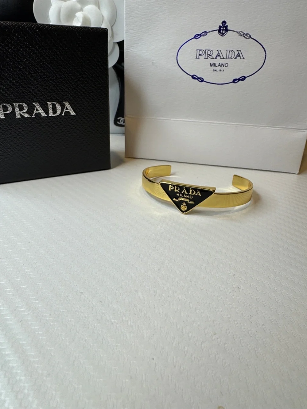 Prada polished gold